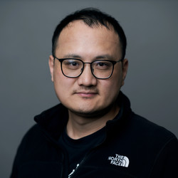 Portrait of Yucheng Wang.
